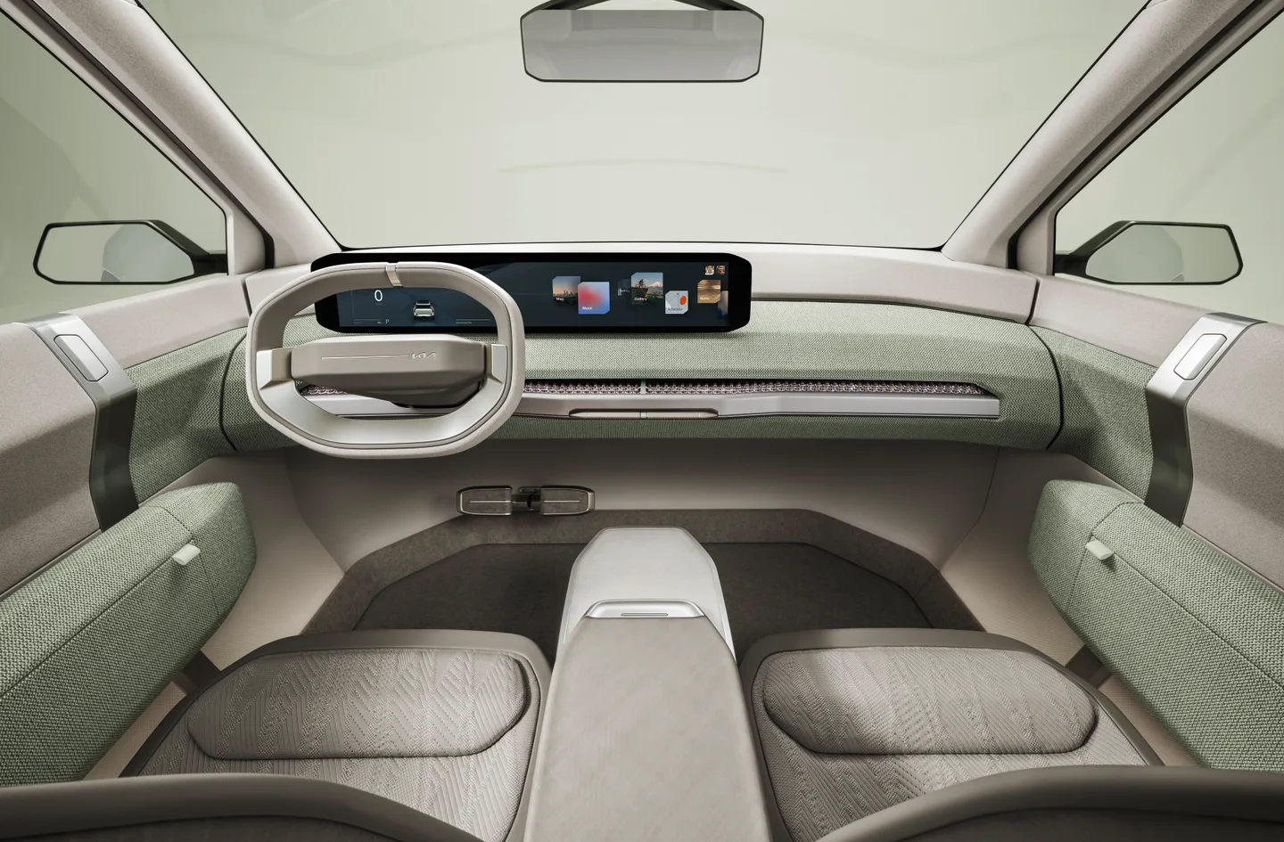 Kia Concept EV3’ün açık yeşil kokpiti ve ön koltukları